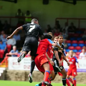 Marvin Elliott's Determined Charge Towards Aldershot's Goal Marvin Elliott's Determined Charge Towards Aldershot's Goal