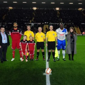 Print of Bristol City mascots clashing with Millwall at Ashton Gate Stadium