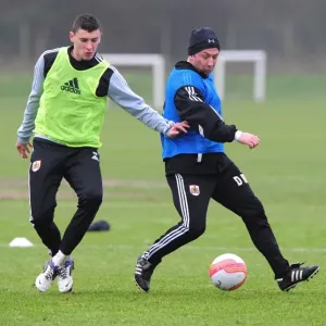 McInnes vs. Wilson: A Training Battle at Memorial Stadium - Derek McInnes Goes Head-to-Head with James Wilson during Bristol City FC Training