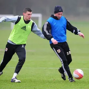 McInnes vs. Wilson: A Training Showdown at Memorial Stadium - Derek McInnes and James Wilson Lock Horns during Bristol City FC Training