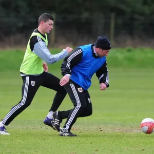 McInnes vs. Wilson: A Training Face-Off at Memorial Stadium - Derek McInnes Goes Head-to-Head with James Wilson during Bristol City FC Practice