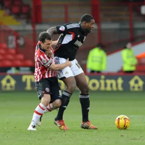 Michael Doyle vs Jay Emmanuel-Thomas: Intense Battle for the Ball in Sheffield United vs Bristol City Football Match, 2014 Michael Doyle vs Jay Emmanuel-Thomas: Intense Battle for the Ball in Sheffield United vs Bristol City Football Match, 2014