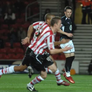 Michael McIndoe sees his penalty saved