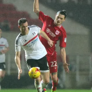 Milan Djuric of Bristol City Clashes with Kevin McDonald of Fulham in Sky Bet Championship Match Milan Djuric of Bristol City Clashes with Kevin McDonald of Fulham in Sky Bet Championship Match