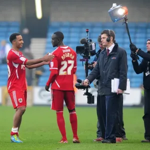 Millwall vs. Bristol City: Nicky Maynard Congratulates Albert Adomah on Man of the Match Award in 2011 Championship Match at Selhurst Park Millwall vs. Bristol City: Nicky Maynard Congratulates Albert Adomah on Man of the Match Award in 2011 Championship Match at Selhurst Park