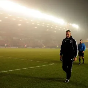 Misty Morning: Keith Milen Navigates Ashton Gate Amidst Bristol City vs Swansea City Championship Clash (01/02/2011)