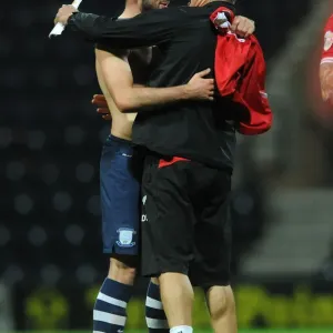 A Moment of Connection: Intense Conversation Between Greg Cunningham and David Coles during Bristol City vs Preston North End A Moment of Connection: Intense Conversation Between Greg Cunningham and David Coles during Bristol City vs Preston North End