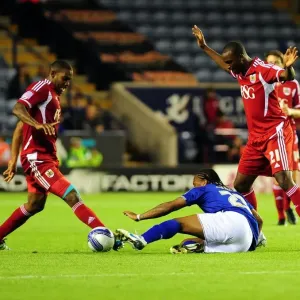 Neil Danns vs. Marvin Elliott and Kalifa Cisse: Intense Battle in Leicester City vs. Bristol City Championship Match, August 2011 Neil Danns vs. Marvin Elliott and Kalifa Cisse: Intense Battle in Leicester City vs. Bristol City Championship Match, August 2011