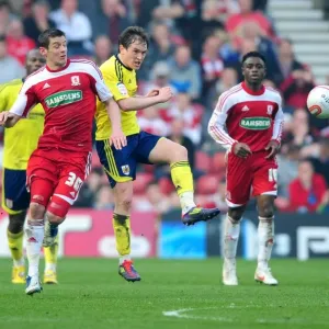 Neil Kilkenny vs. Lukas Jutkiewicz: Battle for the Ball in Middlesbrough vs. Bristol City Football Match, March 2012 Neil Kilkenny vs. Lukas Jutkiewicz: Battle for the Ball in Middlesbrough vs. Bristol City Football Match, March 2012