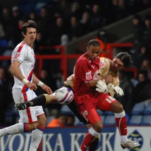 Nicky Maynard battles for the ball with Juilian Speroni Nicky Maynard battles for the ball with Juilian Speroni