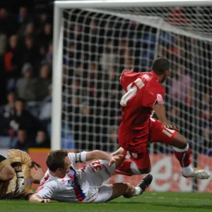 Nicky Maynard slots the ball into the net after rounding Nicky Maynard slots the ball into the net after rounding