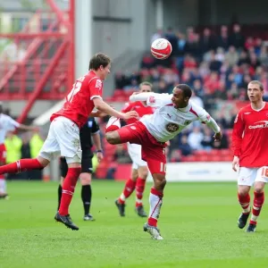 Nicky Maynarrd battles for the ball with