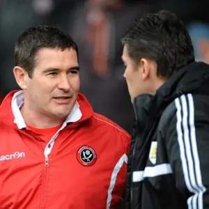 Nigel Clough and Steve Cotterill in Deep Discussion: Sheffield United vs. Bristol City, 2014 Nigel Clough and Steve Cotterill in Deep Discussion: Sheffield United vs. Bristol City, 2014