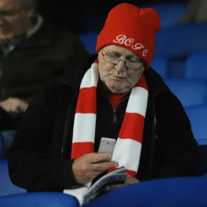 Print of a Bristol City fan at Brighton's Community Stadium