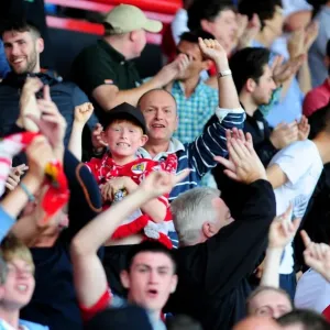 Passionate Crowd: Bristol City Fans at Ashton Gate Stadium Passionate Crowd: Bristol City Fans at Ashton Gate Stadium