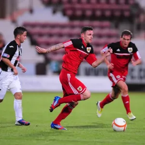 Paul Anderson Bolts Past Defenders in Pre-Season Friendly: Dunfermline vs. Bristol City Paul Anderson Bolts Past Defenders in Pre-Season Friendly: Dunfermline vs. Bristol City