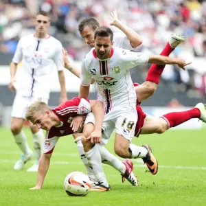 Print of a Penalty Dispute between Joe Bryan and MK Dons Players Print of a Penalty Dispute between Joe Bryan and MK Dons Players