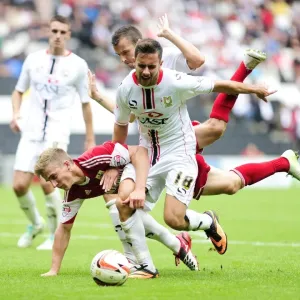 Print of a Penalty Dispute between Joe Bryan and MK Dons Players Print of a Penalty Dispute between Joe Bryan and MK Dons Players