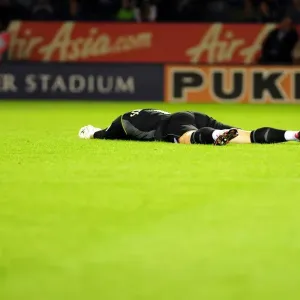 Print of a goalkeeper's reaction to a missed shot in the Championship Print of a goalkeeper's reaction to a missed shot in the Championship