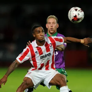 Scott Wagstaff Chases Down Craig Braham-Barrett in Johnstone's Paint Trophy Clash: Intense Moment at Abbey Business Stadium