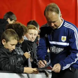 Sean O'Driscoll of Bristol City Signs Autographs for Young Fans during Bristol City v Brentford Match