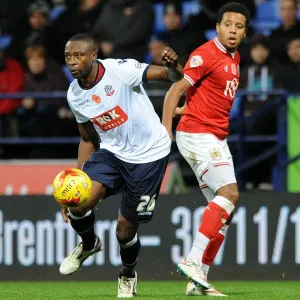 Shola Ameobi Slips Past Korey Smith: Intense Moment from Bolton Wanderers vs. Bristol City Championship Clash Shola Ameobi Slips Past Korey Smith: Intense Moment from Bolton Wanderers vs. Bristol City Championship Clash
