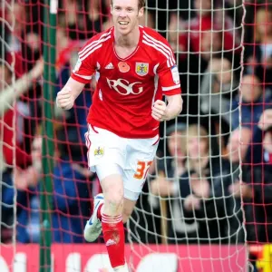 Print of Stephen Pearson scoring for Bristol City against Burnley in 2011