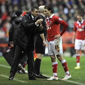 Steve Cotterill Conferes with Luke Freeman during Bristol City's Match against Yeovil Town, December 2014