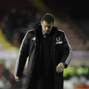 Steve Cotterill: A Dejected Manager After Brentford's Victory Over Bristol City Steve Cotterill: A Dejected Manager After Brentford's Victory Over Bristol City