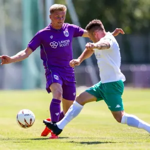 Taylor Moore in Action: Pre-season Friendly between Guernsey FC and Bristol City Taylor Moore in Action: Pre-season Friendly between Guernsey FC and Bristol City
