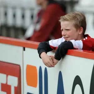 Thrilling Moment: Young Bristol City Fan's Expressive Reaction at Stevenage Match, April 2014 Thrilling Moment: Young Bristol City Fan's Expressive Reaction at Stevenage Match, April 2014