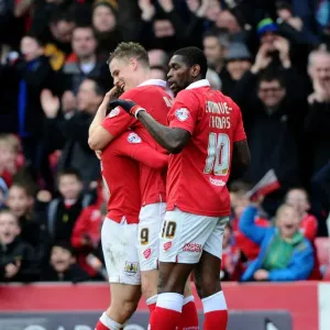 Triumphant Threesome: Matt Smith, Luke Freeman, and Jay Emmanuel-Thomas Celebrate Bristol City's Win Against Sheffield United