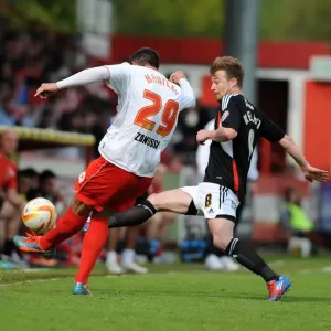 Wade Elliott Closes In: Intense Moment as Bristol City Star Confronts Stevenage's Peter Hartley Wade Elliott Closes In: Intense Moment as Bristol City Star Confronts Stevenage's Peter Hartley