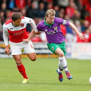 Wade Elliott vs Antoni Sarcevic: Intense Battle in Fleetwood Town vs Bristol City Football Match, 2014 Wade Elliott vs Antoni Sarcevic: Intense Battle in Fleetwood Town vs Bristol City Football Match, 2014