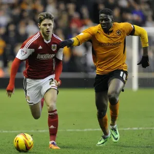 Wes Burns vs Bakary Sako: Intense Battle at Molineux Stadium - Wolves vs Bristol City, Sky Bet League One