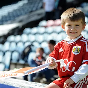 Young Bristol City Fan's Excitement at Rochdale AFC's Spotland Stadium