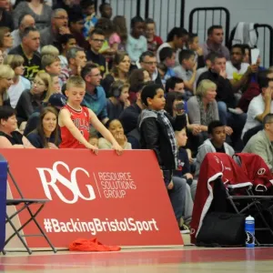 Young Fan Holds RSG Board at Bristol Flyers vs. Plymouth Raiders Basketball Game Young Fan Holds RSG Board at Bristol Flyers vs. Plymouth Raiders Basketball Game