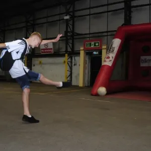 Young Fan Takes Aim at Ashton Gate: Bristol City vs. Bradford City, 2013 Young Fan Takes Aim at Ashton Gate: Bristol City vs. Bradford City, 2013