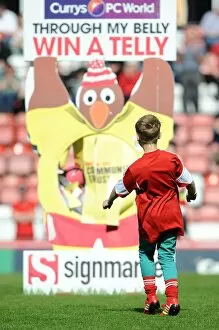 Images Dated 18th April 2014: 10-Year-Old Soccer Sensation Luca Fortuna Secures Thrilling Victory for Bristol City Against Notts