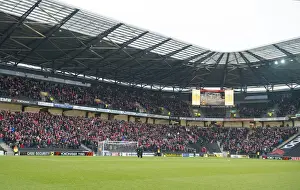 MK Dons V Bristol City Fans Prints: Over 5000 Bristol City fans wave scarves in the away end - Photo mandatory by-line