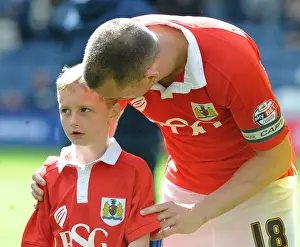 Promotion Prints: Aaron Wilbraham and the Bristol City Mascot Before the Preston North End Match, 2015