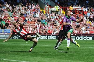 Images Dated 9th August 2014: Aaron Wilbraham Chases Down the Ball: Sheffield United vs. Bristol City