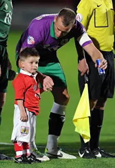 Aaron Wilbraham and Mascot Celebrate Bristol City's Victory over Cheltenham Town, October 8, 2014