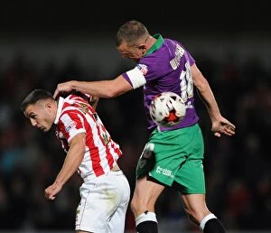 Images Dated 8th October 2014: Aaron Wilbraham vs. Lee Vaughan: Heading Battle at Abbey Business Stadium - Cheltenham Town vs