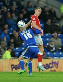 Cardiff City V Bristol City Prints: Aaron Wilbraham vs Matthew Connolly: Intense Aerial Battle at Cardiff City Stadium, 2015