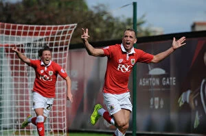 Images Dated 16th August 2014: Aaron Wilbraham's Thrilling Goal Celebration: A Memorable Moment at Ashton Gate