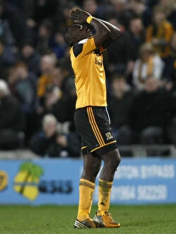 Images Dated 19th April 2013: Abdoulaye Faye Contemplates Championship Draw: Hull City vs. Bristol City, 2013