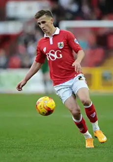 Bristol City V Oldham Prints: Action-Packed Moment: Joe Bryan in Full Throttle for Bristol City at Ashton Gate