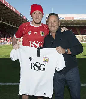 Action-Packed Rivalry: Luke Ayling in Full Swing at Ashton Gate