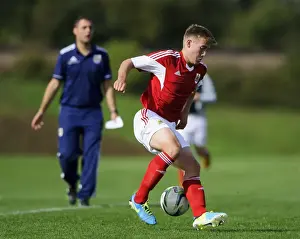 Development Prints: Action-Packed U18 Football: Withey Tackles Forward in Bristol City vs Brighton Match